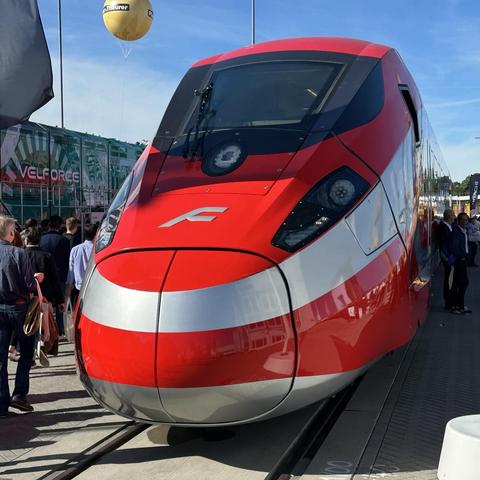 Front side of a red high speed train